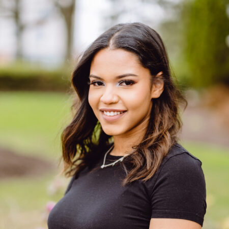 A portrait of Gabriella on campus at Goldey-Beacom College