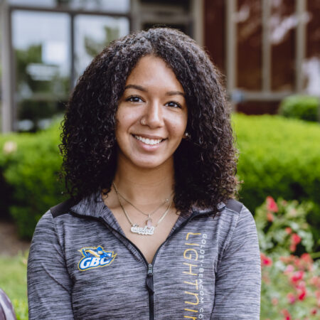 A portrait of Jazlee on campus at Goldey-Beacom College