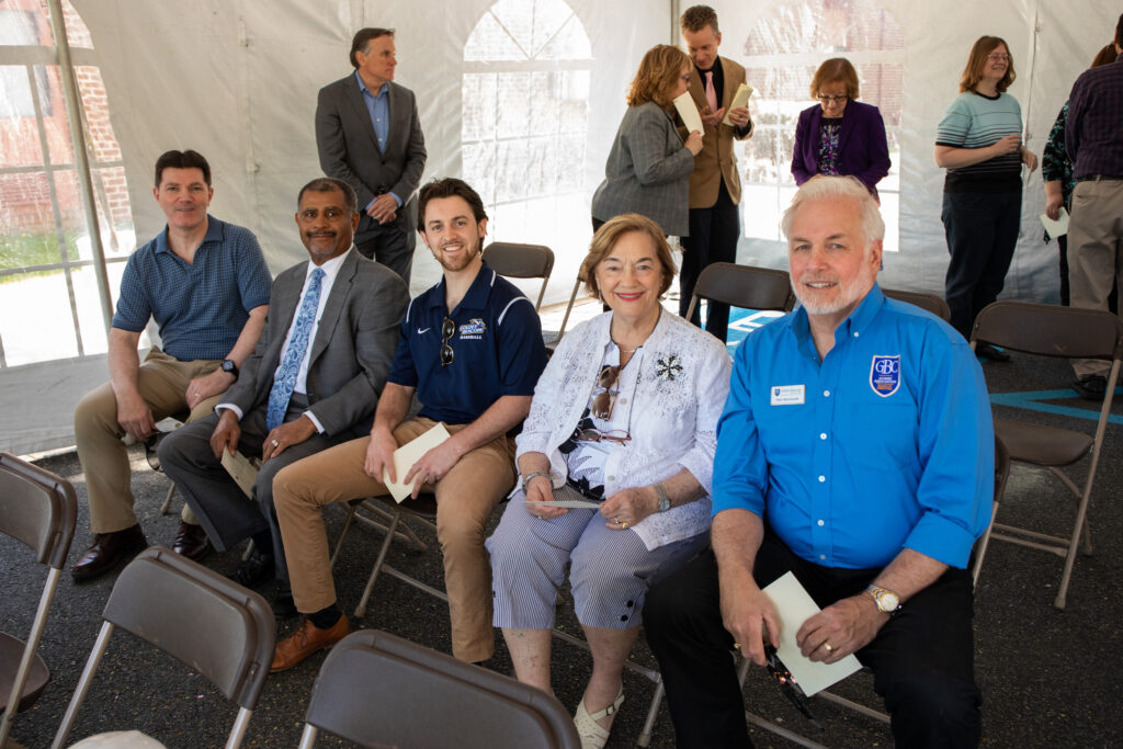 John Kenneth Banaszak sitting in a tent at a GBC event.