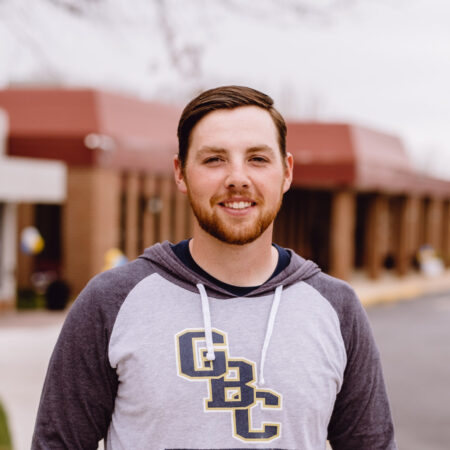 A portrait of Marshall on campus at Goldey-Beacom College