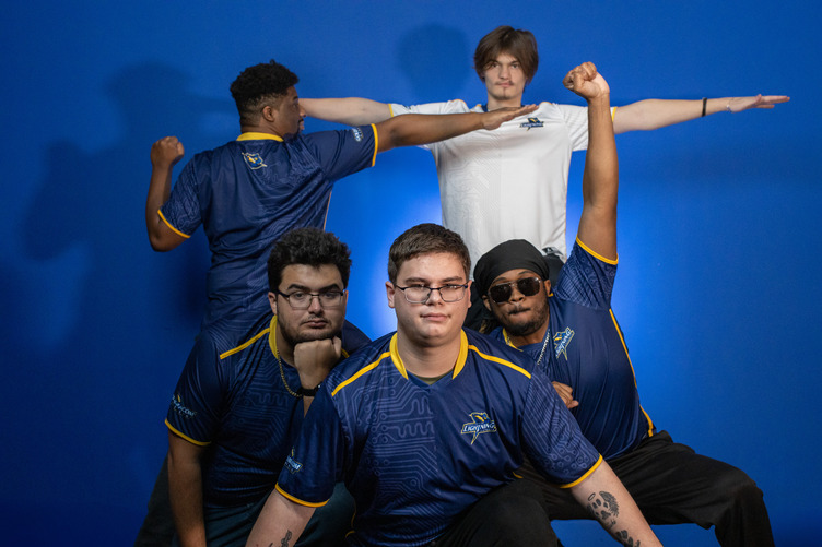 Esports team members posing on their media day 
